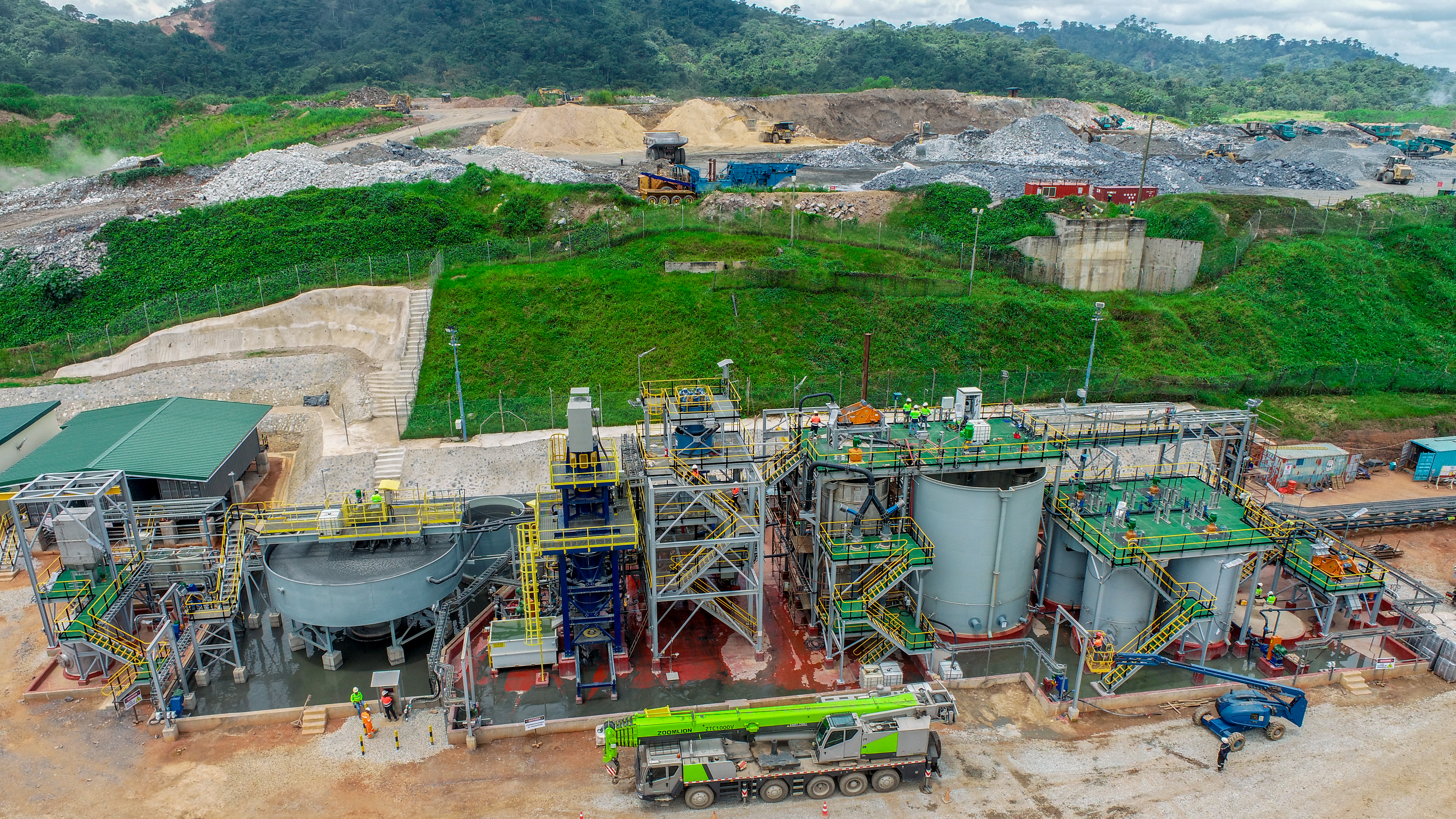 Ghanaian mine workers in proper protective equipment conducting safe operations